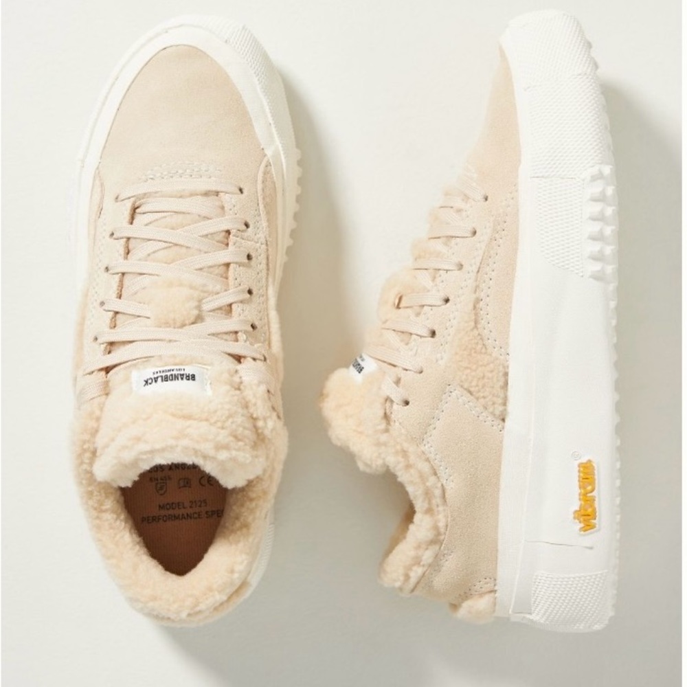 Brandblack faux-shearling sneaker